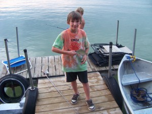 Kailon Johnston (age 9) with a bluegill.