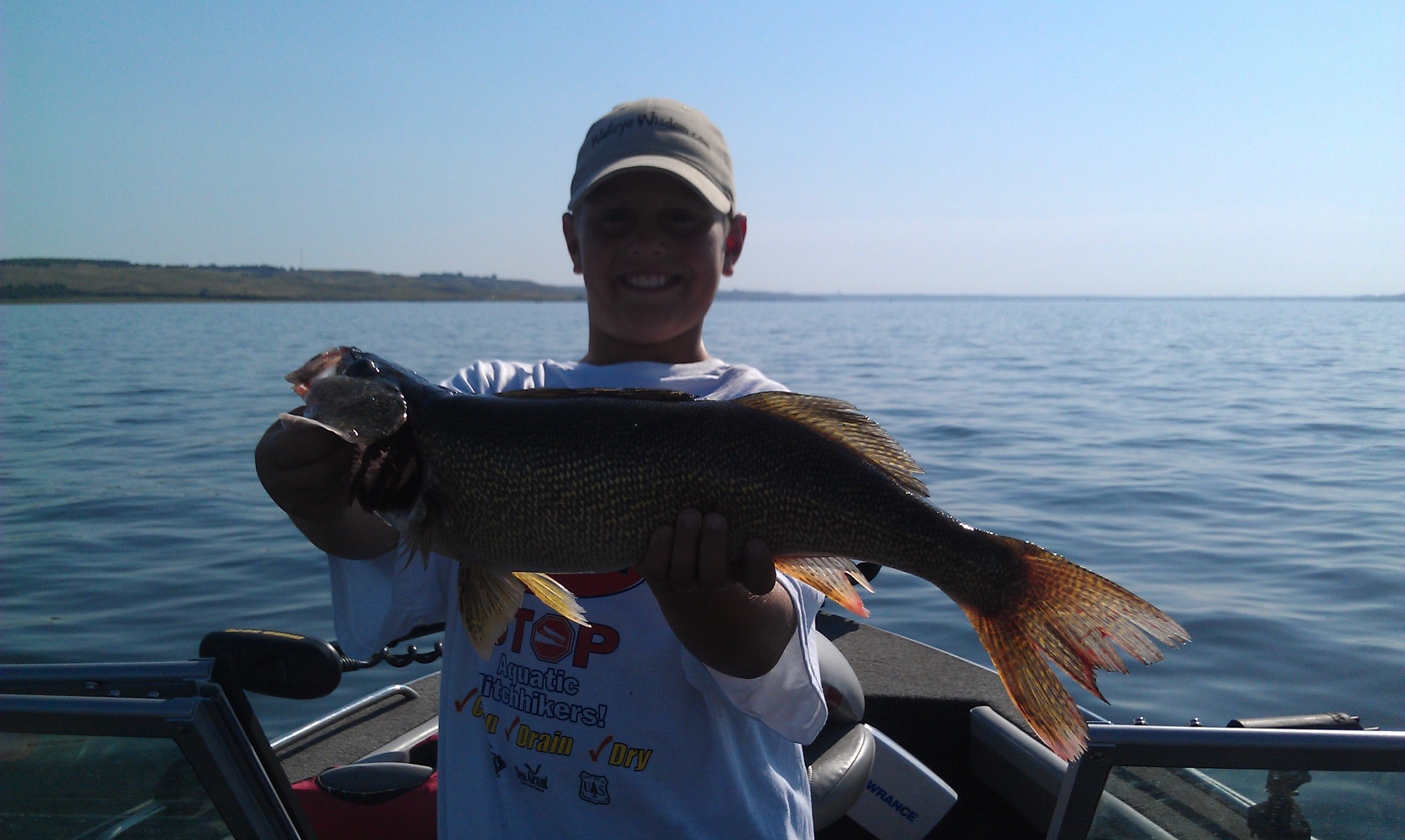 Jerrick Meyer lands a keeper walleye.