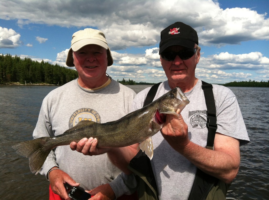 Brothers Denny and Dave Lensch with one of their many slot walleyes!