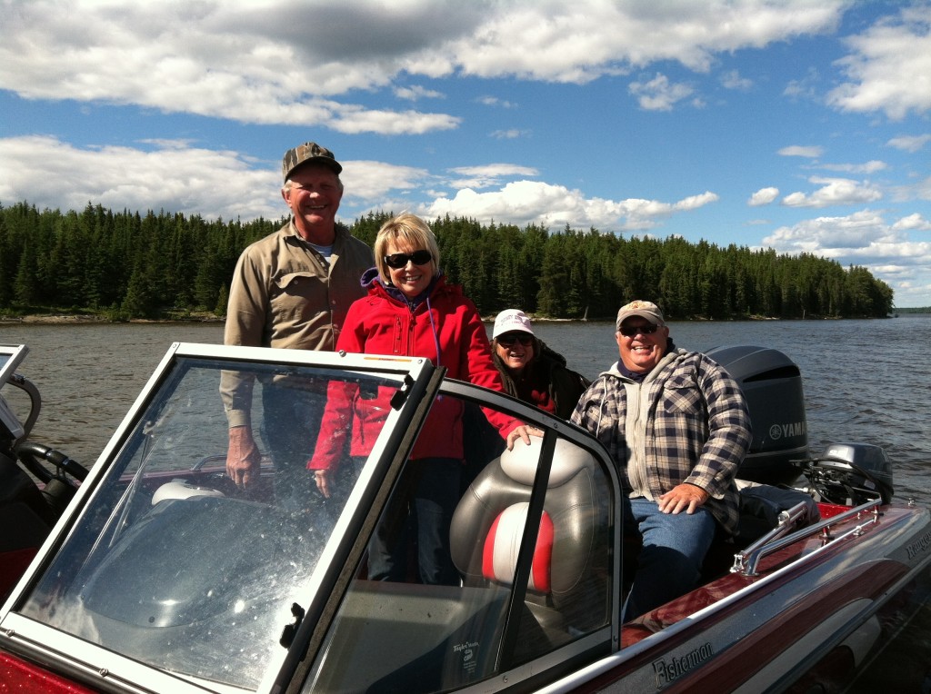 These two couples from Southwest Iowa came to us on their 9.9 because the big motor would not start!  He borrowed Spike's jumper cables and the big Yammie started!  The ladies were not looking forward to a three hour ride back to their camp on the kicker!  Lesson learned--carry jumper cables in your boat ALL the time!!