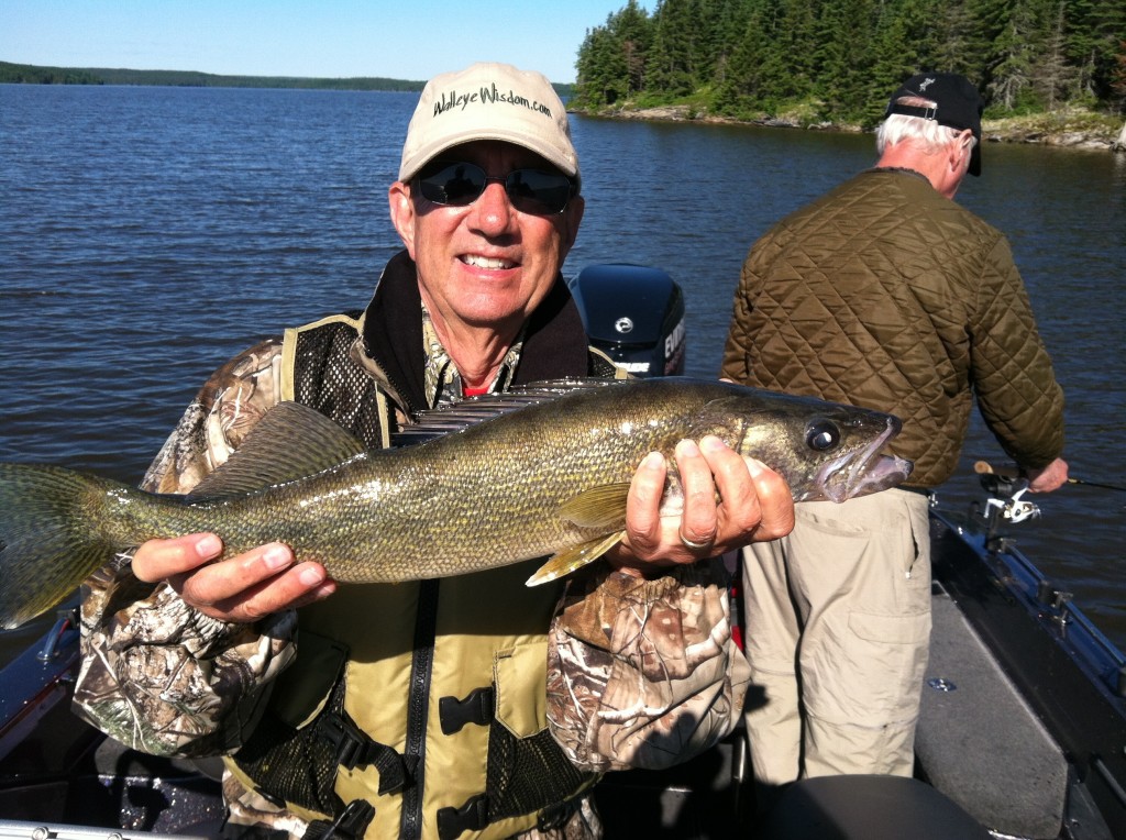 Dannie Keck was all smiles with one if the many walleye he caught with the walleyewisdom fishing team!  Danny had never caught a walleye until Lac Seul--he also caught the biggest for the week--a nearly 26 incher!  Way to go, rookie!!