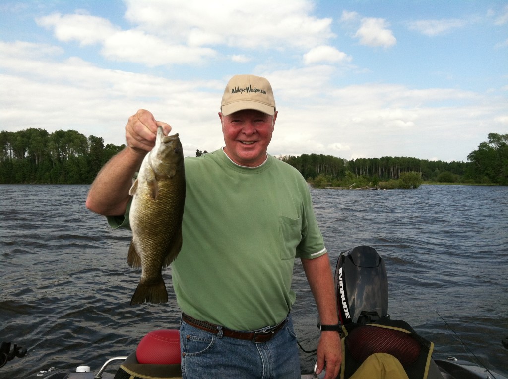 Here's Denny with a really nice smallmouth bass caught on "Matt's Point" our first day on the water!