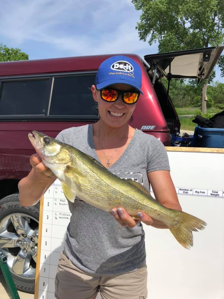 Becky holding a walleye at Pleasant Creek 2020