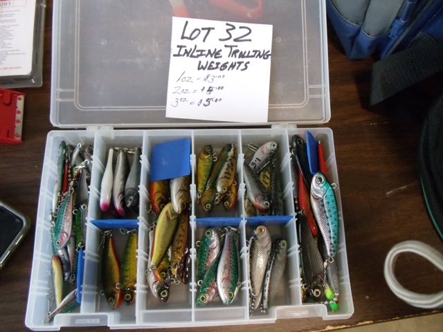 Tackle shelves lined with baits and accessories (gallery view)