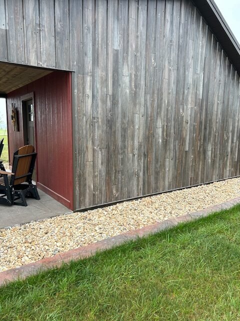 Fish House positioned near the water at Camp Courageous (gallery view)