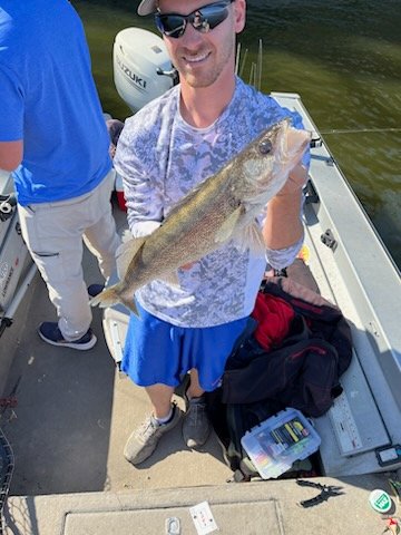 Boat-side shot of Mike with a Coralville walleye (gallery view)